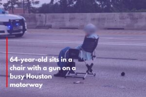 64-year-old sits in a chair with a gun on a busy Houston motorway
